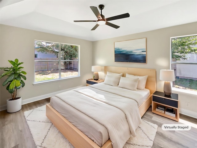 1406 Rio Bravo Loop, Leander, TX 78641 - bedroom featuring wood finished floors and ceiling fan