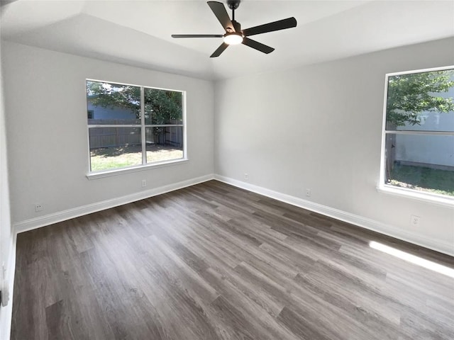 1406 Rio Bravo Loop, Leander, TX 78641 - spare room with dark wood-type flooring and ceiling fan