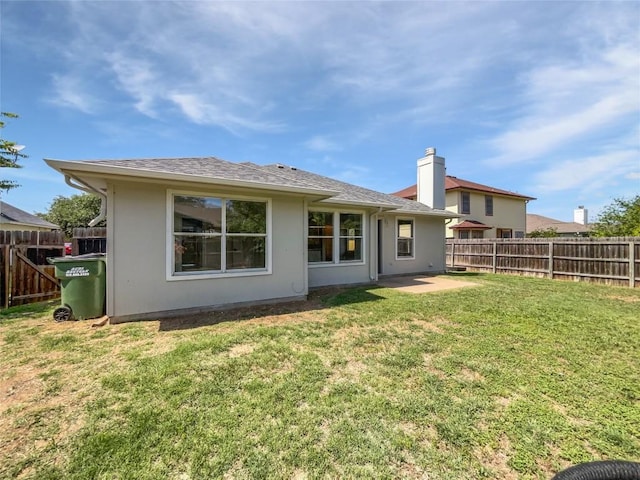 1406 Rio Bravo Loop, Leander, TX 78641 - back of property featuring roof with shingles