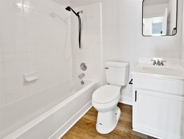 1406 Rio Bravo Loop, Leander, TX 78641 - bathroom with wood finished floors, vanity, and washtub / shower combination