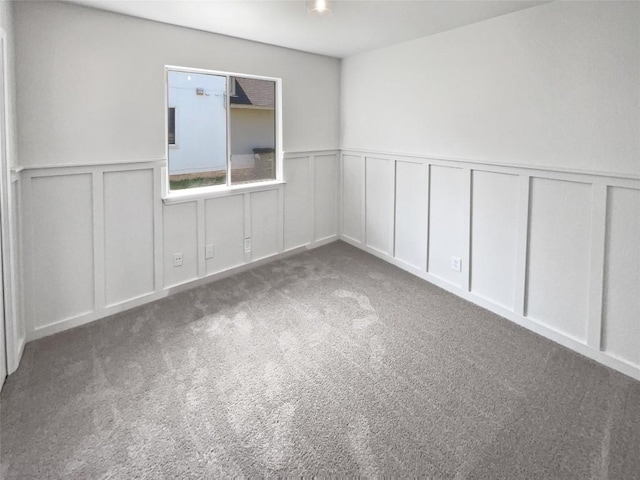 1406 Rio Bravo Loop, Leander, TX 78641 - carpeted spare room featuring a decorative wall and a wainscoted wall