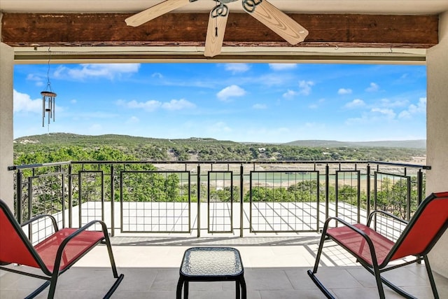 balcony featuring a mountain view