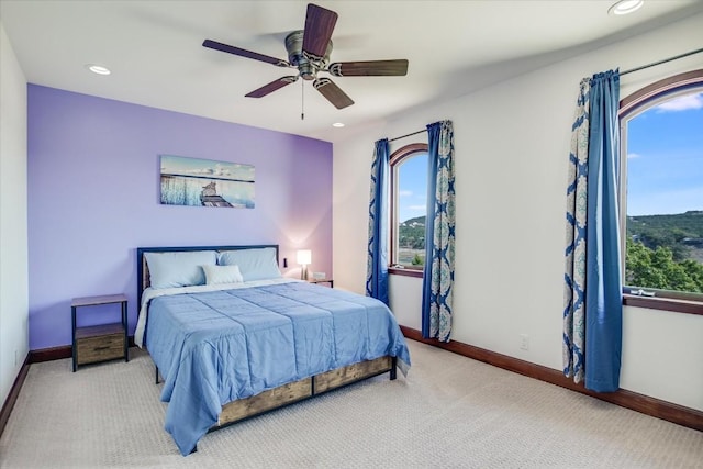 bedroom with carpet floors and ceiling fan