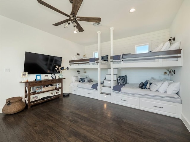 bedroom featuring dark hardwood / wood-style floors and ceiling fan