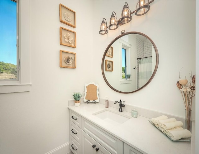 bathroom featuring vanity and walk in shower