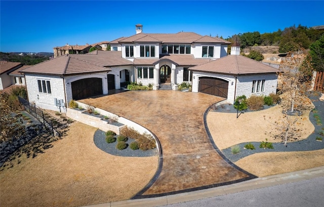 view of front of property with a garage