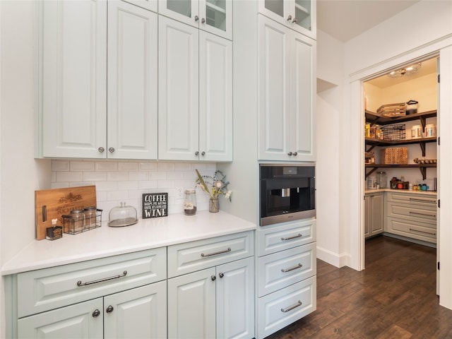 102 Canyon Turn Trl, Austin, TX 78734 - kitchen with backsplash, dark wood-style flooring, white cabinets, and glass insert cabinets