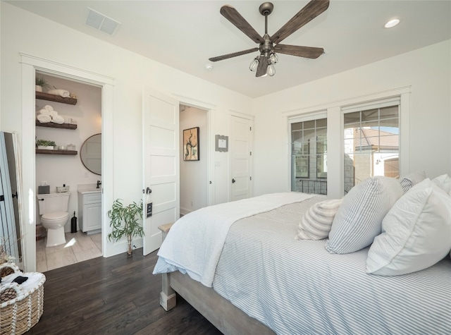 102 Canyon Turn Trl, Austin, TX 78734 - bedroom with ensuite bath, visible vents, dark wood finished floors, recessed lighting, and baseboards