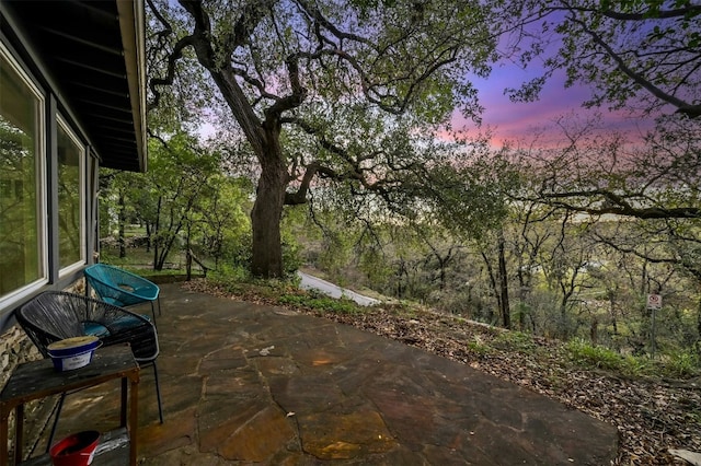 view of patio terrace at dusk