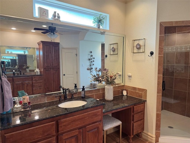 bathroom featuring vanity, tile patterned floors, a shower with door, and ceiling fan