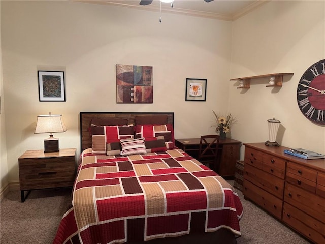 carpeted bedroom featuring ornamental molding and ceiling fan