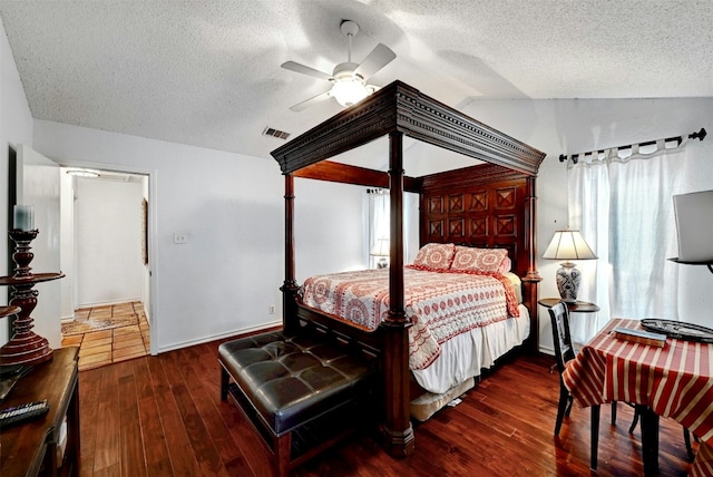 107 S Cuernavaca Dr, Austin, TX 78733 - bedroom with lofted ceiling, a textured ceiling, wood finished floors, and ceiling fan