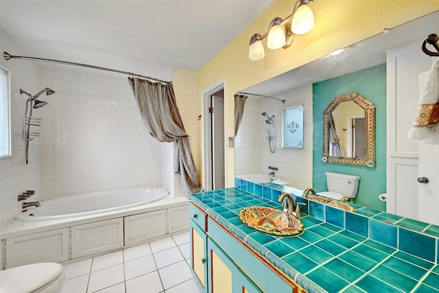 bathroom featuring shower / bath combination with curtain, tile patterned flooring, vanity, and toilet