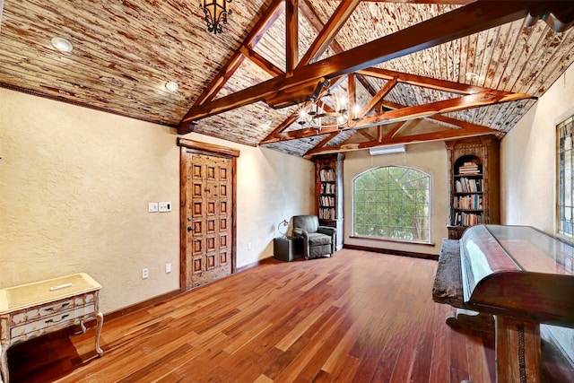 107 S Cuernavaca Dr, Austin, TX 78733 - living area with a textured wall, a chandelier, lofted ceiling, hardwood / wood-style floors, and plenty of natural light