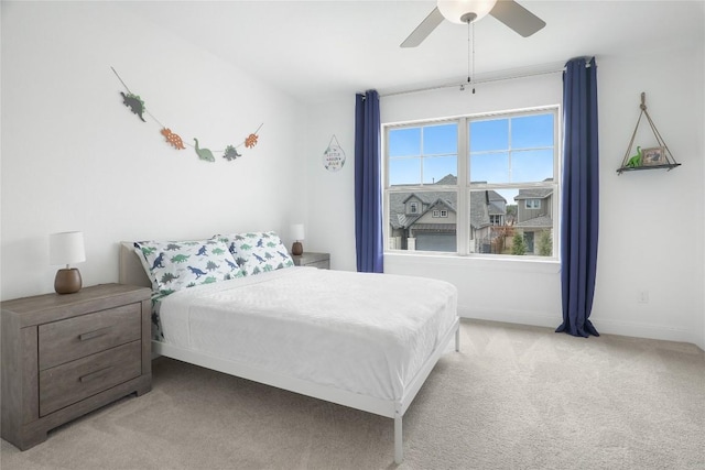 821 Olinda Way, Liberty Hill, TX 78642 - bedroom with light carpet and a ceiling fan