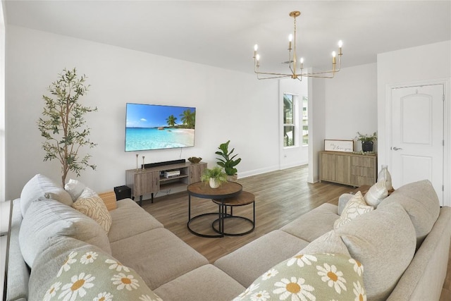 821 Olinda Way, Liberty Hill, TX 78642 - living room featuring a chandelier and wood finished floors