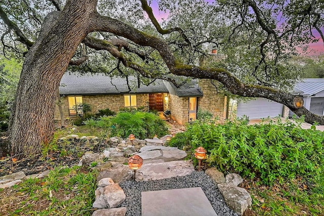 view of front of home with a garage