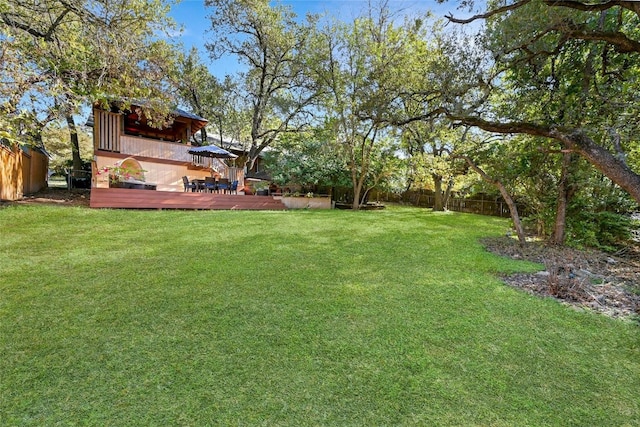 view of yard with a deck