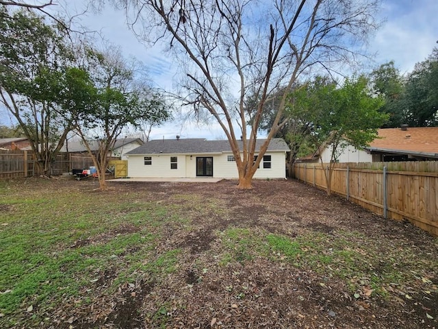 back of house featuring a patio area