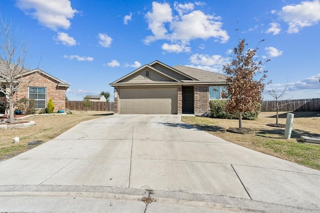 single story home featuring a garage and a front yard