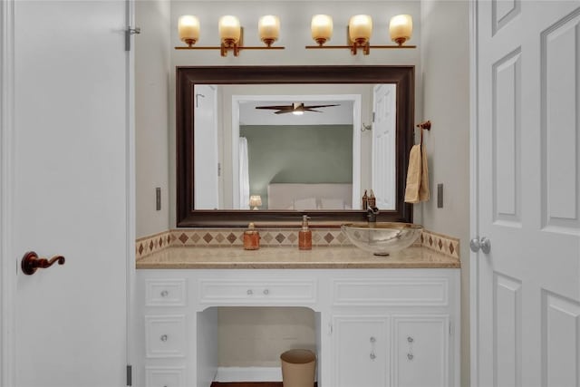 bathroom with vanity and backsplash