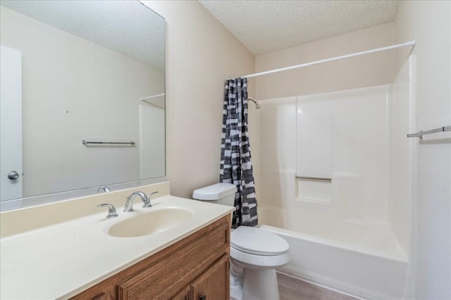 bathroom with toilet, shower / tub combo, a textured ceiling, vanity, and wood finished floors