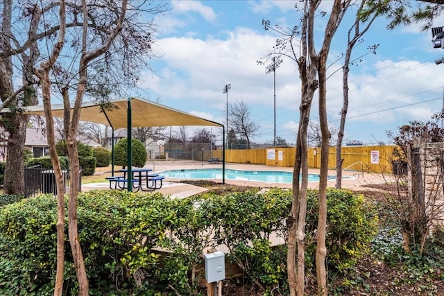 community pool with fence