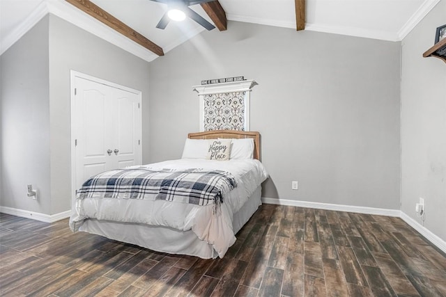 bedroom with lofted ceiling with beams, ceiling fan, and a closet