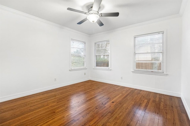 unfurnished room featuring ceiling fan, ornamental molding, wood-type flooring, and plenty of natural light