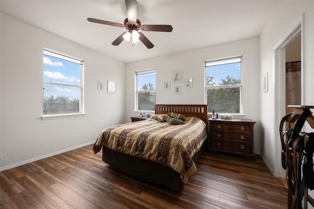 bedroom featuring dark hardwood / wood-style floors and ceiling fan