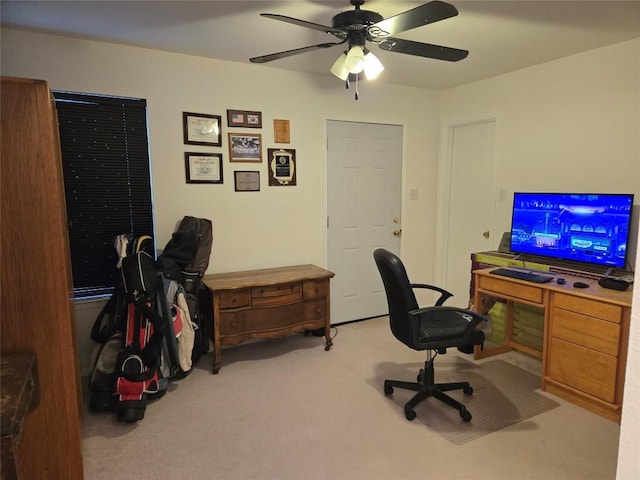 office area featuring ceiling fan and carpet floors