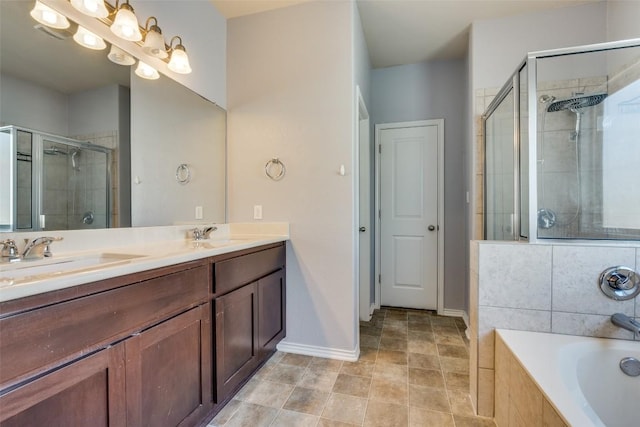 bathroom with plus walk in shower and vanity