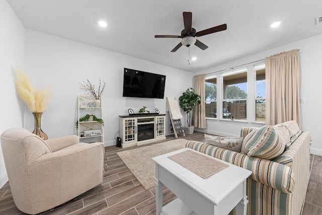 living room featuring ceiling fan