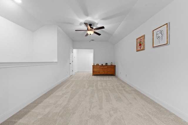 125 Jasmine Ln, Marble Falls, TX 78654 - additional living space with light carpet, a ceiling fan, baseboards, and lofted ceiling