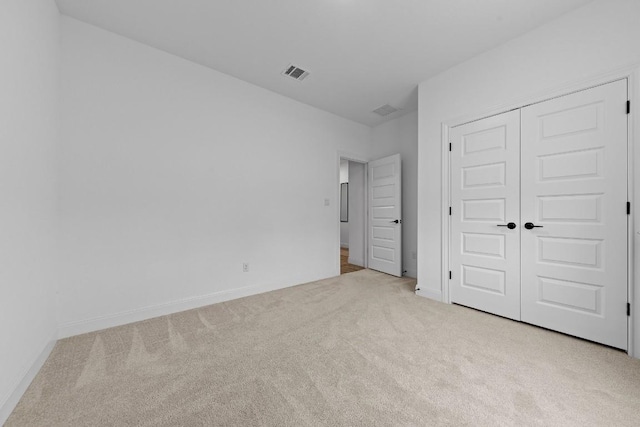 125 Jasmine Ln, Marble Falls, TX 78654 - unfurnished bedroom featuring carpet, a closet, and baseboards