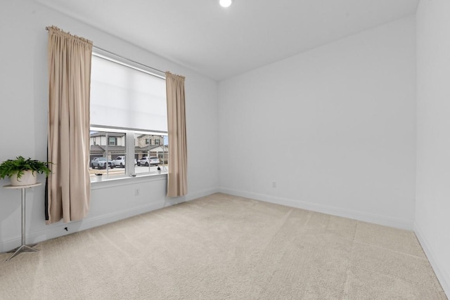 125 Jasmine Ln, Marble Falls, TX 78654 - unfurnished room with healthy amount of natural light, light colored carpet, and baseboards