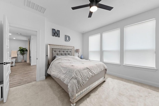 125 Jasmine Ln, Marble Falls, TX 78654 - bedroom featuring carpet flooring, baseboards, and a ceiling fan