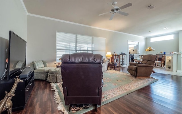 living room featuring crown molding, dark hardwood / wood-style floors, and ceiling fan