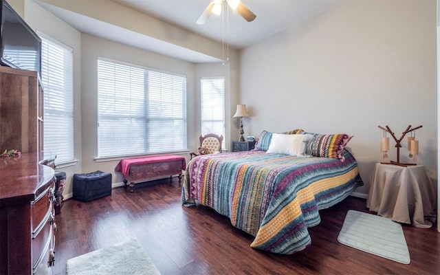 bedroom featuring dark hardwood / wood-style floors and ceiling fan