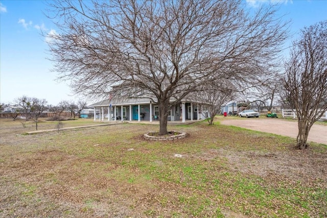 view of yard featuring a porch