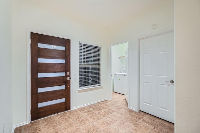 entryway featuring washer / dryer