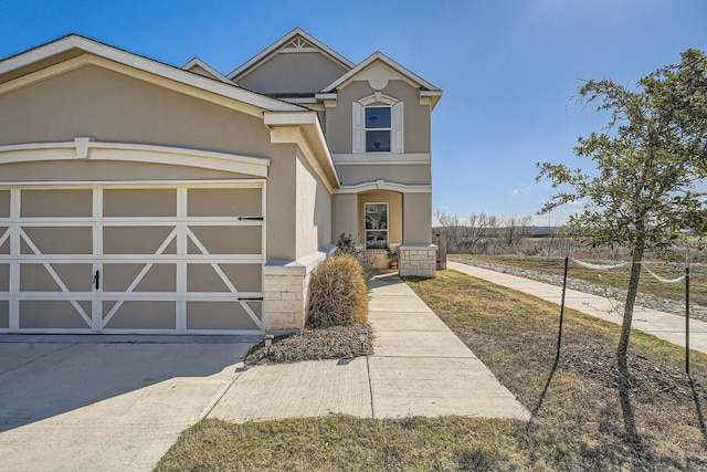 view of front of home with a garage