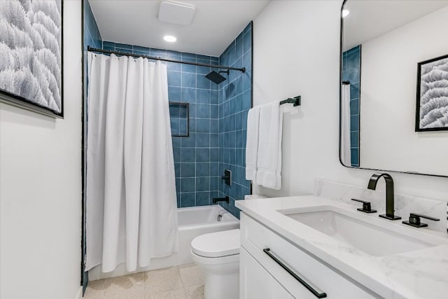 full bathroom with shower / tub combo with curtain, vanity, and toilet