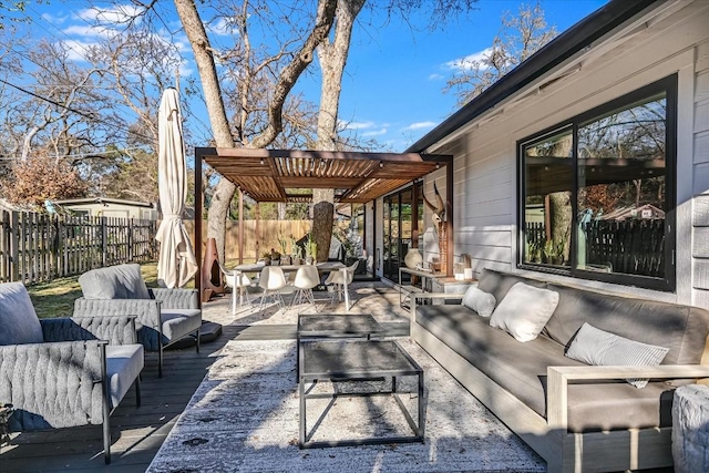 view of patio with an outdoor living space, a pergola, and a wooden deck