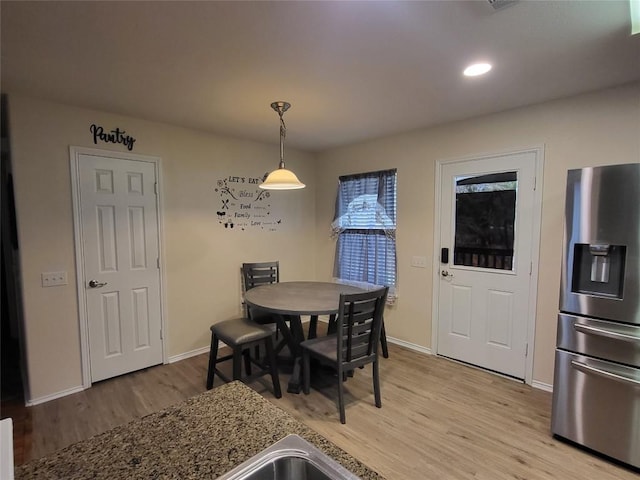 dining area featuring light hardwood / wood-style floors