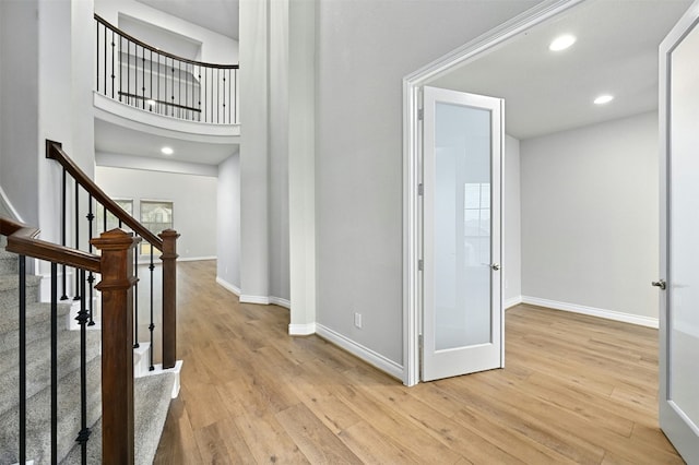 entrance foyer with light wood-type flooring