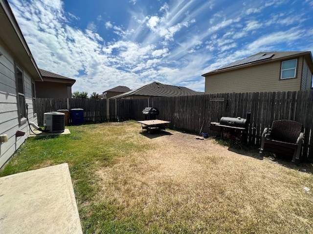 view of yard featuring central AC