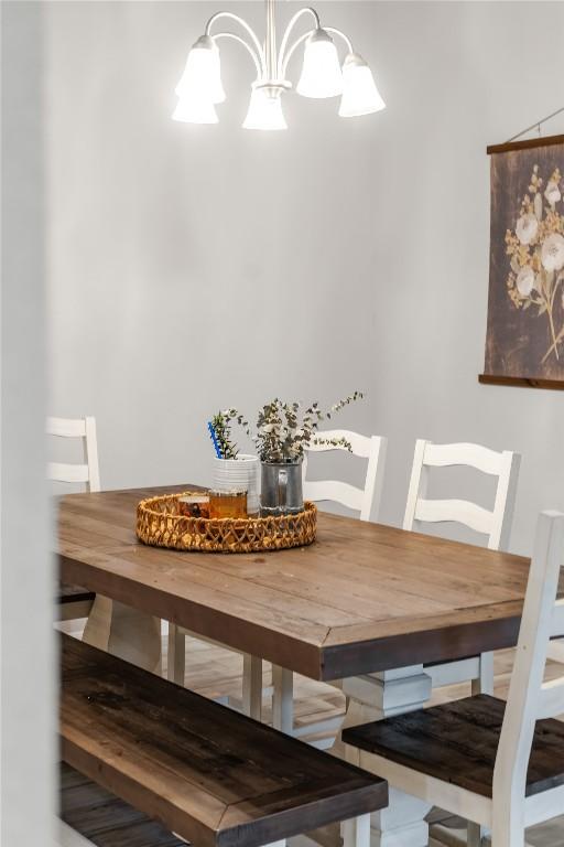 dining room featuring a notable chandelier