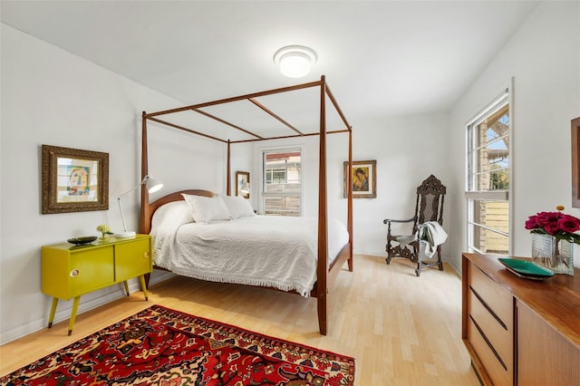 bedroom with light hardwood / wood-style flooring