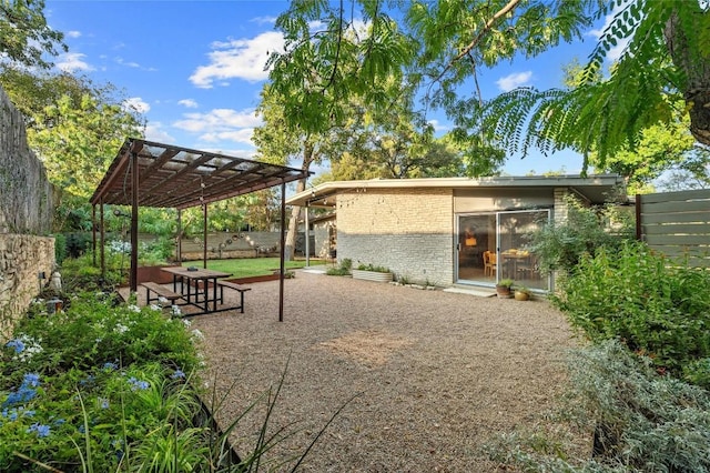 exterior space featuring a pergola